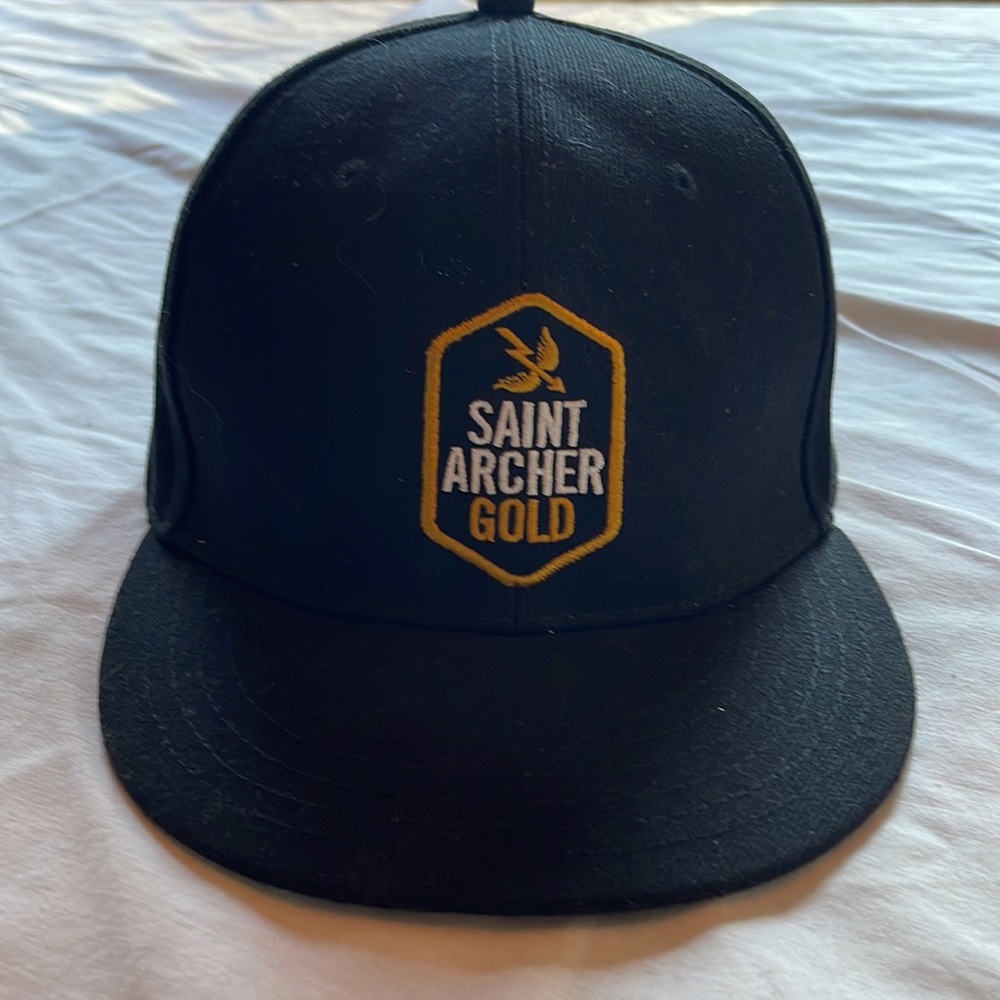 Saint Archer Gold one size fits all flat brim cap